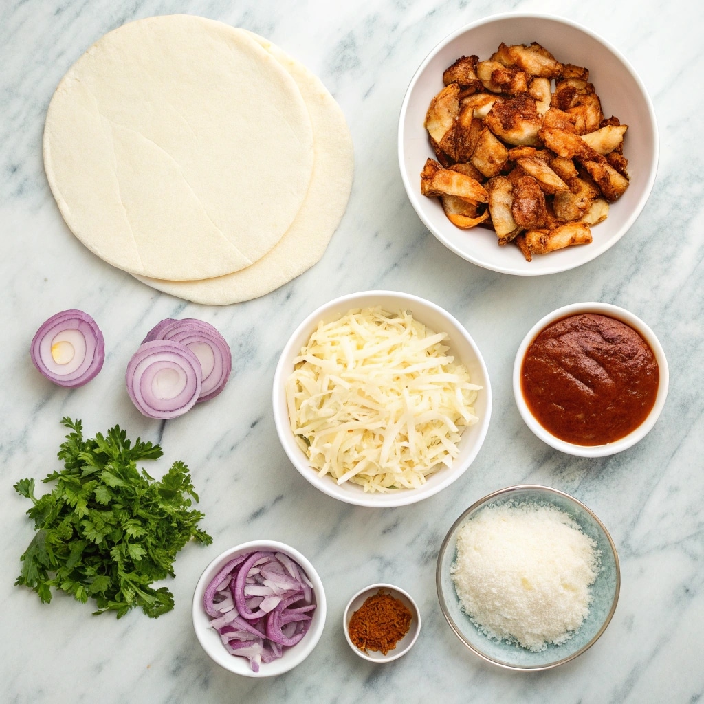 BBQ Chicken Pizza ingredients on countertop