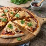 Sliced BBQ Chicken Pizza ready to serve